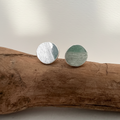 Orecchini argento su legno - luce filtrata